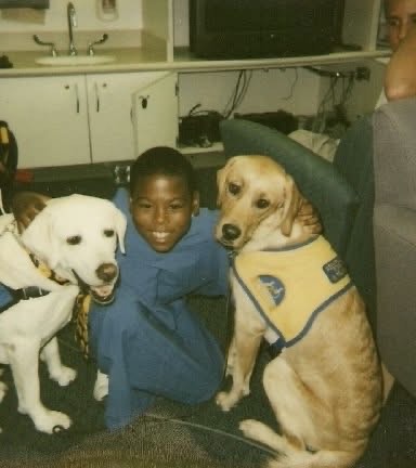 Andre with two service dogs