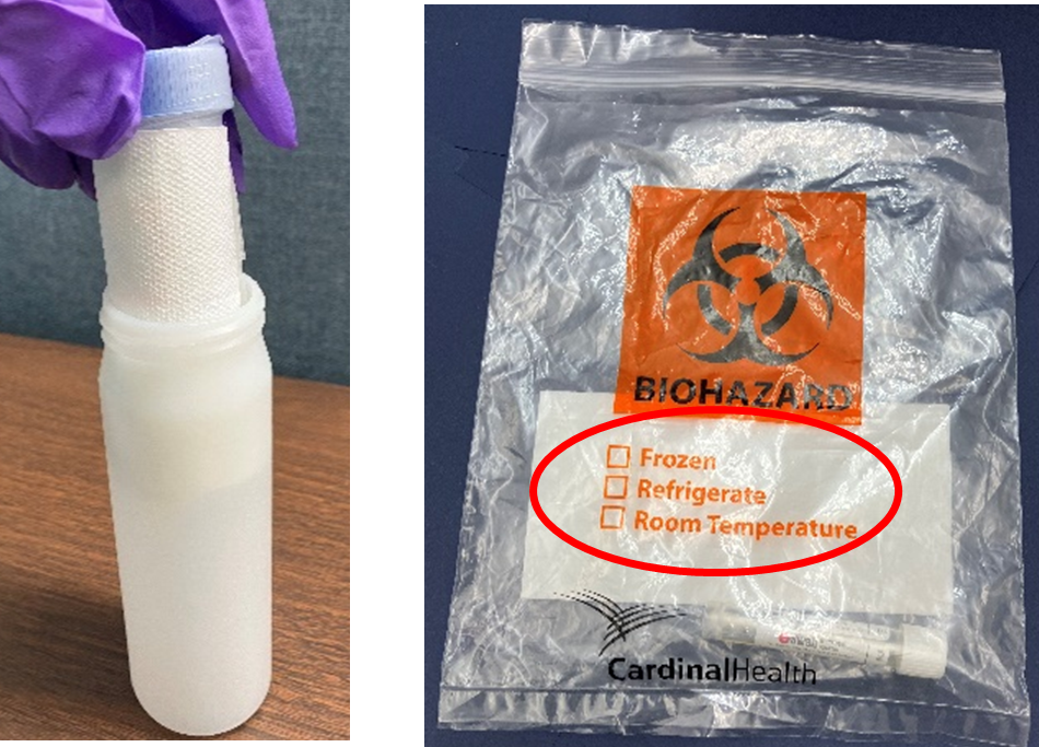 A biohazard bag lays on a table top. A large orange